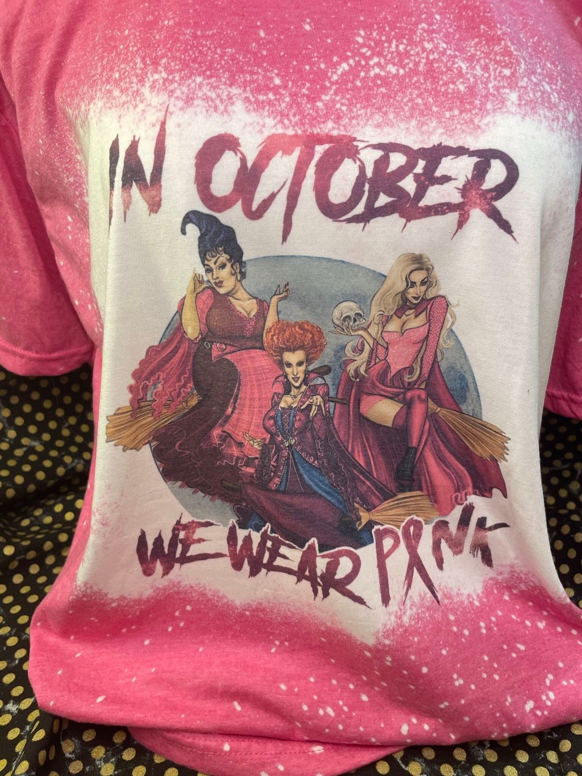 In October we wear pink witches bleached shirt. Bleached pink shirt. We wear pink.