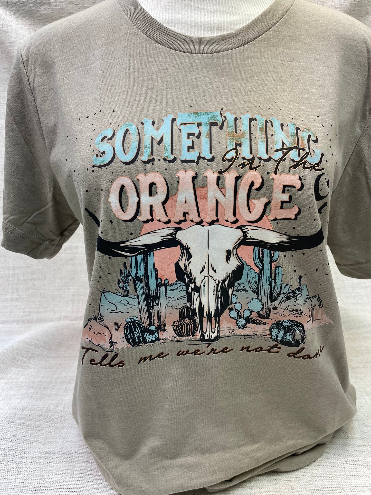 Something in the orange tells me were not done shirt, cow skull shirt, desert shirt, cowboy shirt